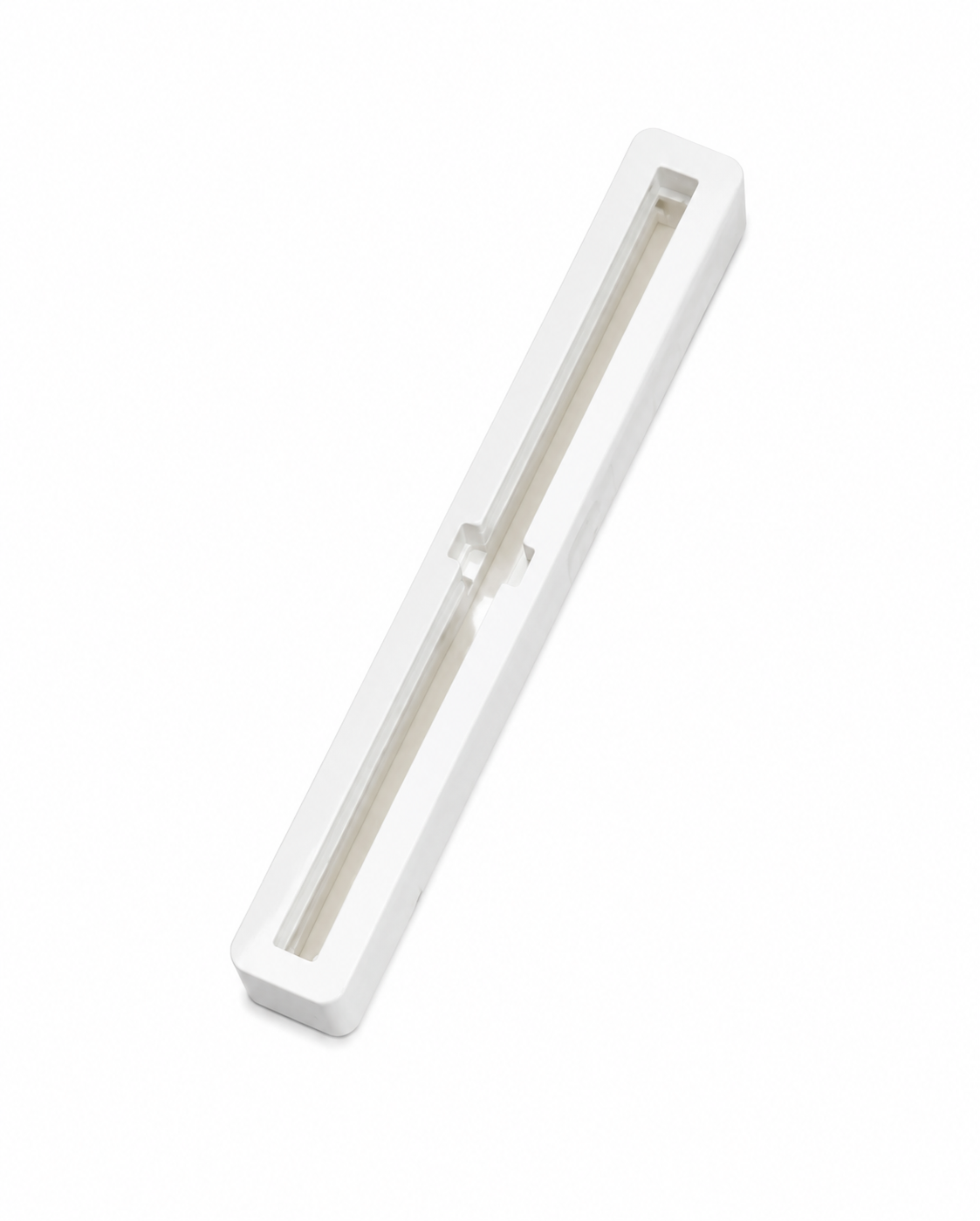 White 7.5 inch Bahne center fin box for surfboards.