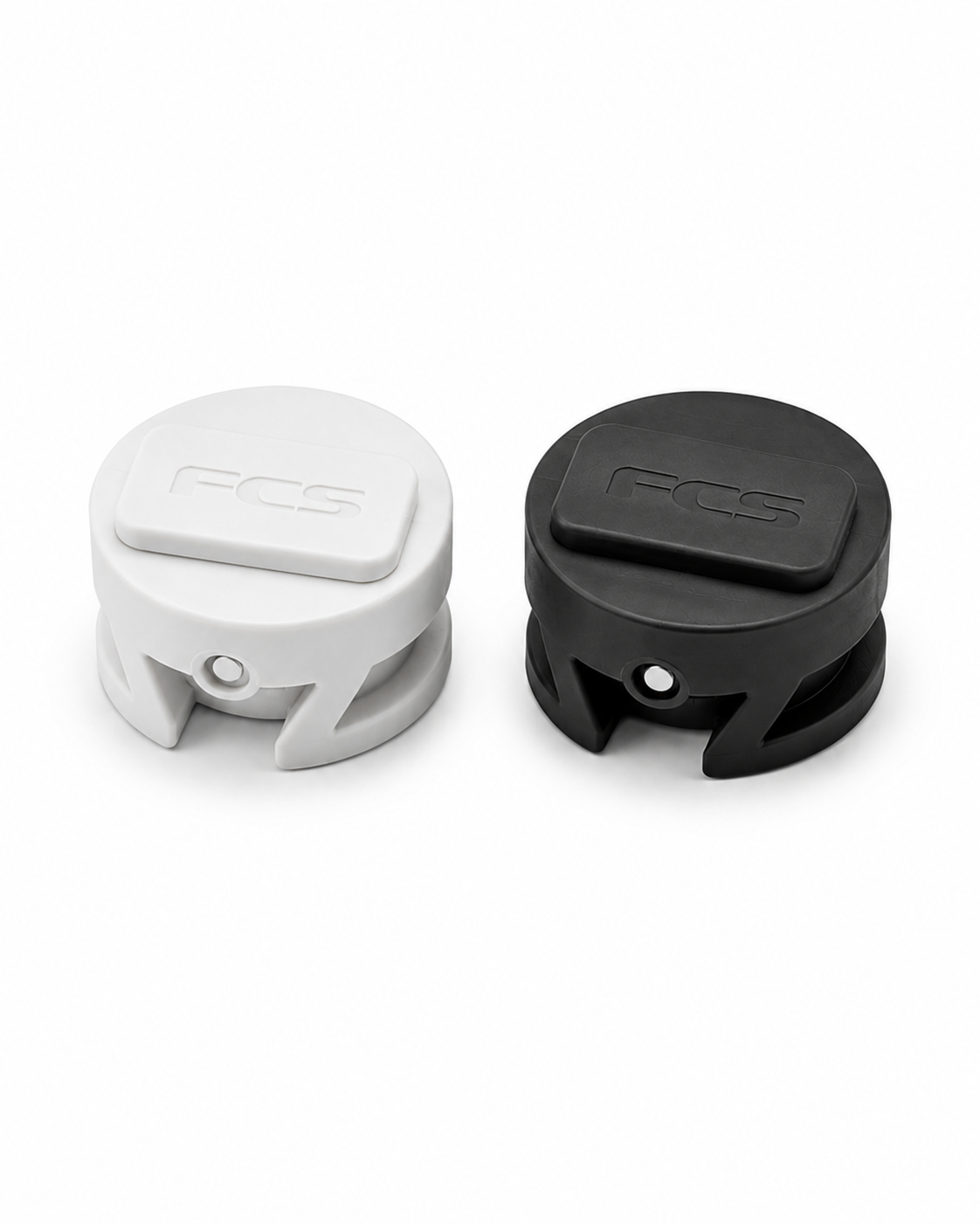 Genuine FCS leash plugs available in white and black for surfboard manufacturing and repairs