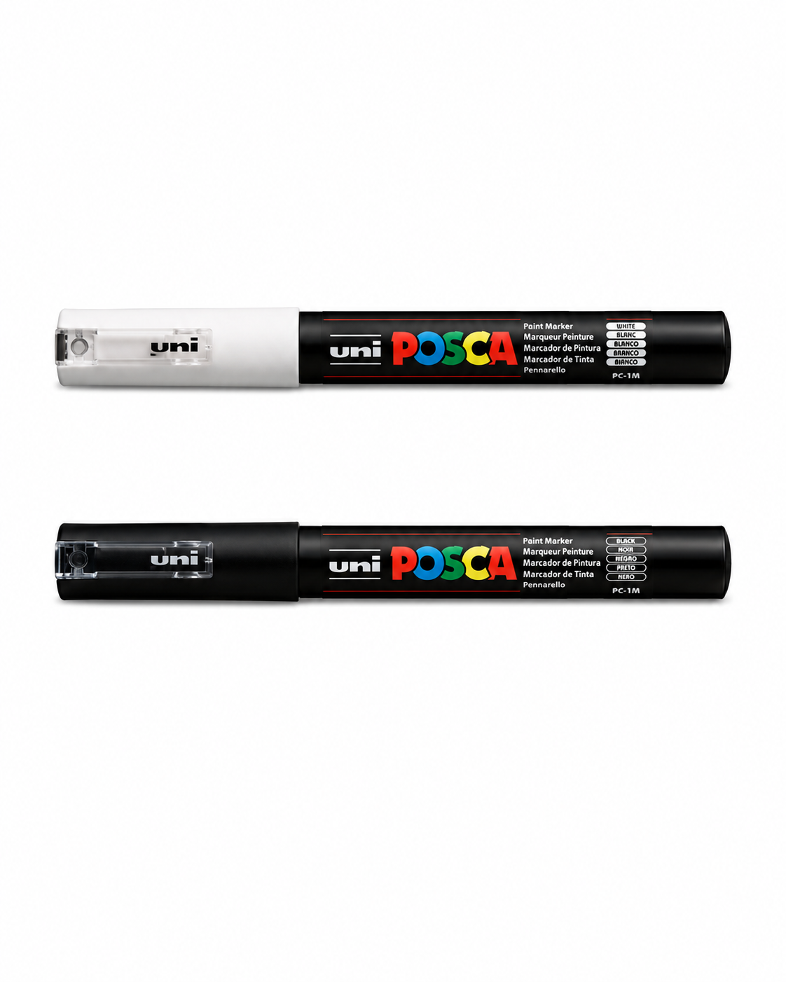 Black and white POSCA PC-1M fine tip paint markers for detailed surfboard artwork