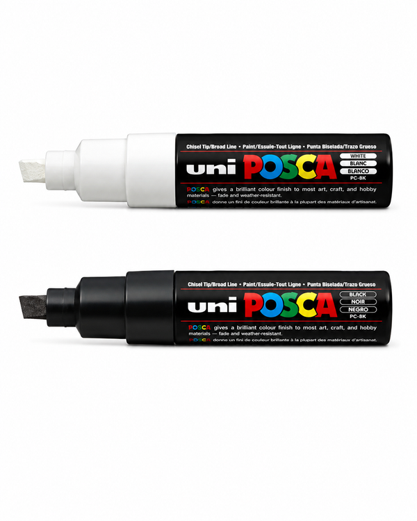 Black and white POSCA PC-8K broad tip paint markers for surfboard artwork and large graphics
