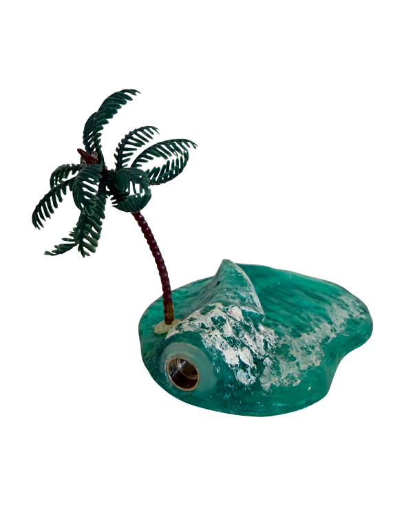 Side view of handcrafted surf barrel sculpture with resin artwork