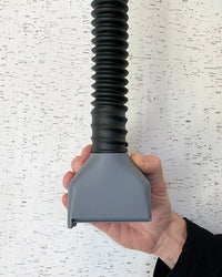Skil 100 vacuum port connected to flexible surfboard planer dust collection hose