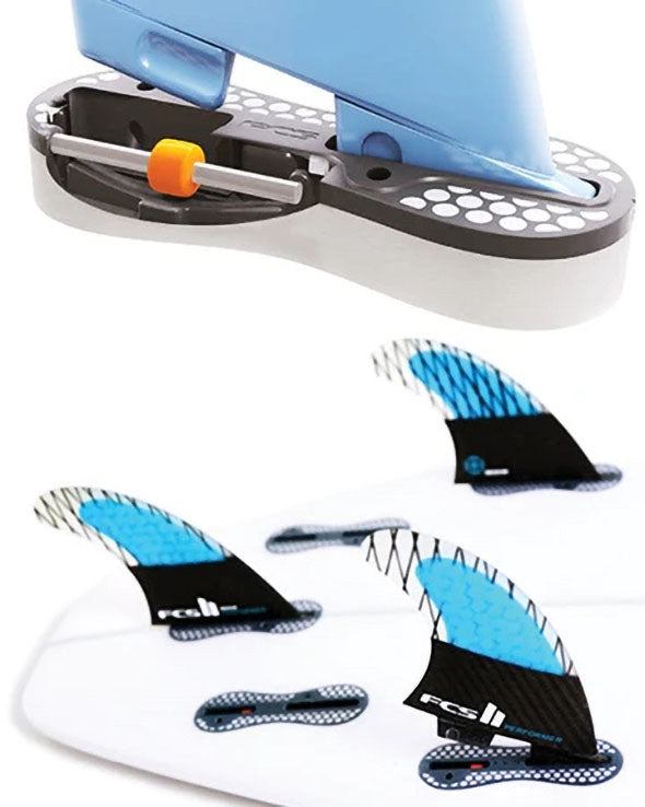 Black FCS II surfboard fin plug for surfboard manufacturing and repairs